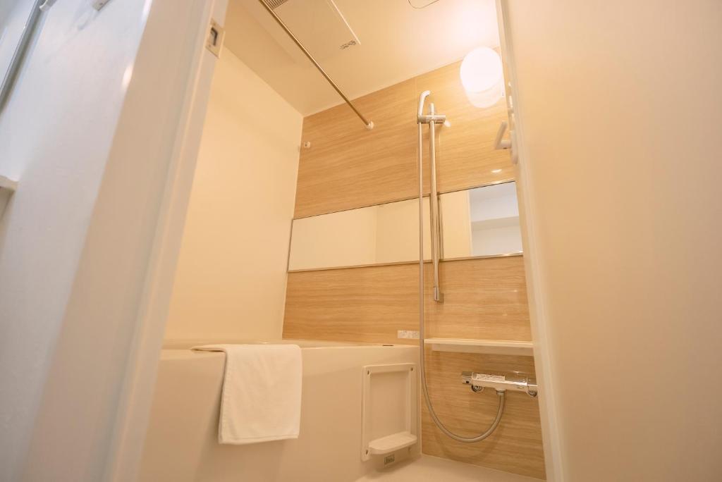 Koupelna v ubytování 谷町君 HOTEL 恵美須町72