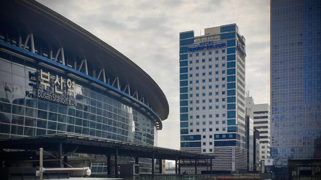 a group of tall buildings in a city at Toyoko Inn Busan Station No.1 in Busan