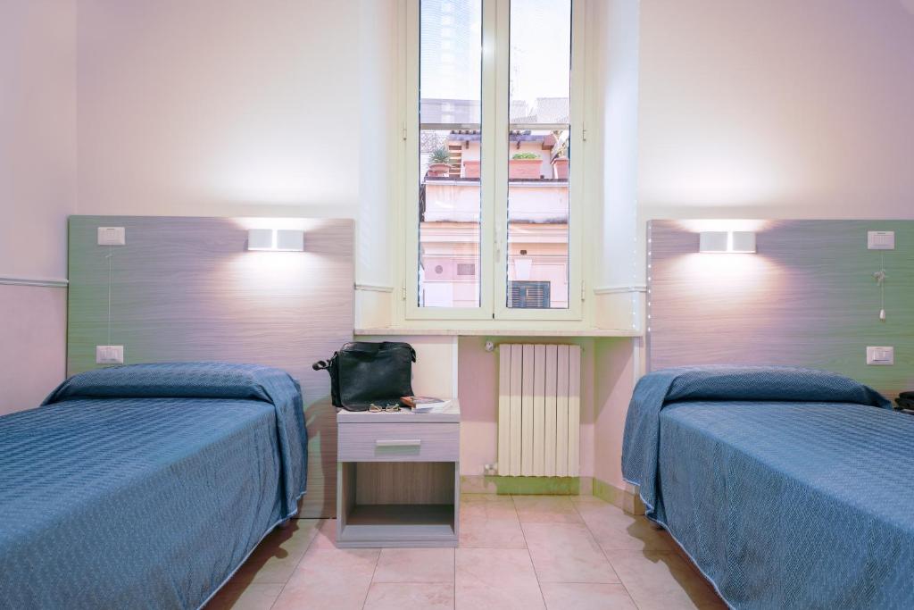 Postel nebo postele na pokoji v ubytování Casa San Giuseppe