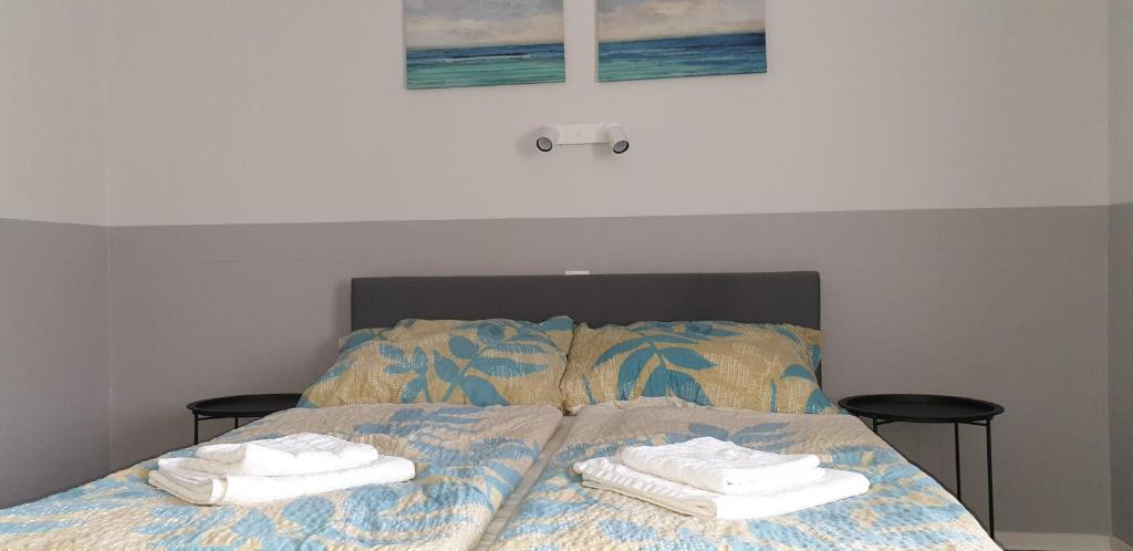 Postel nebo postele na pokoji v ubytování Doris Hotel