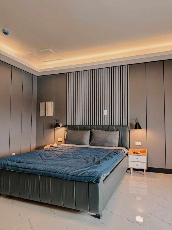 Postel nebo postele na pokoji v ubytování Clark CU Hotel