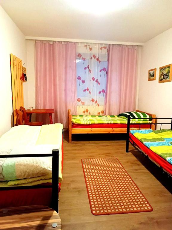 Postel nebo postele na pokoji v ubytování Hotel Zemlinski