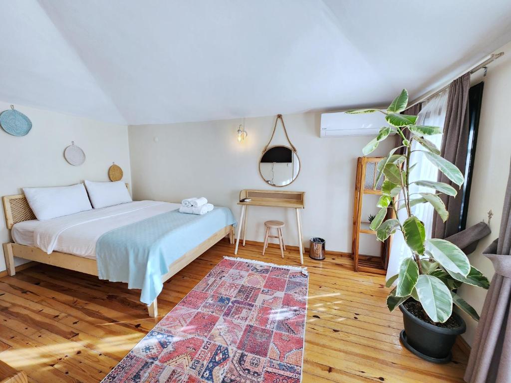 Postel nebo postele na pokoji v ubytování Aya Butik Otel
