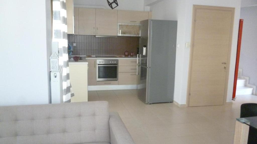 Kuchyň nebo kuchyňský kout v ubytování HOME SWEET HOME