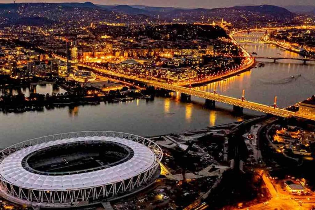 a view of the principality stadium at night at Fogarasi - Relax Island in Budapest