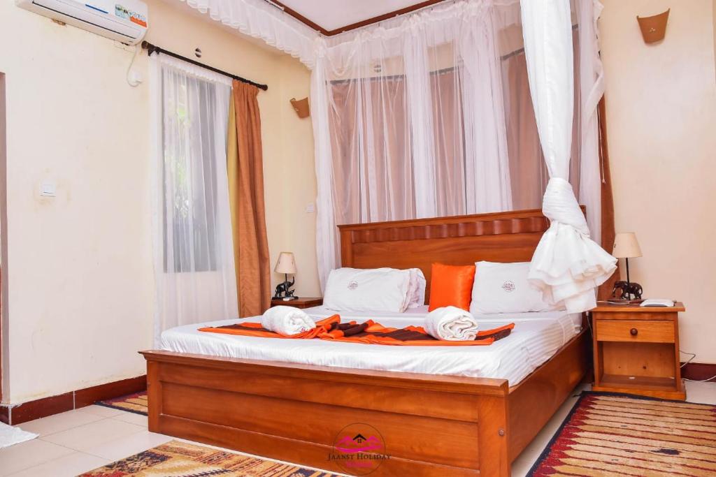 Ένα ή περισσότερα κρεβάτια σε δωμάτιο στο Jaanst Holiday Homes-Sunset