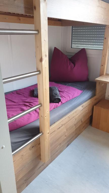 Postel nebo postele na pokoji v ubytování Gletscher-Trail Hostel