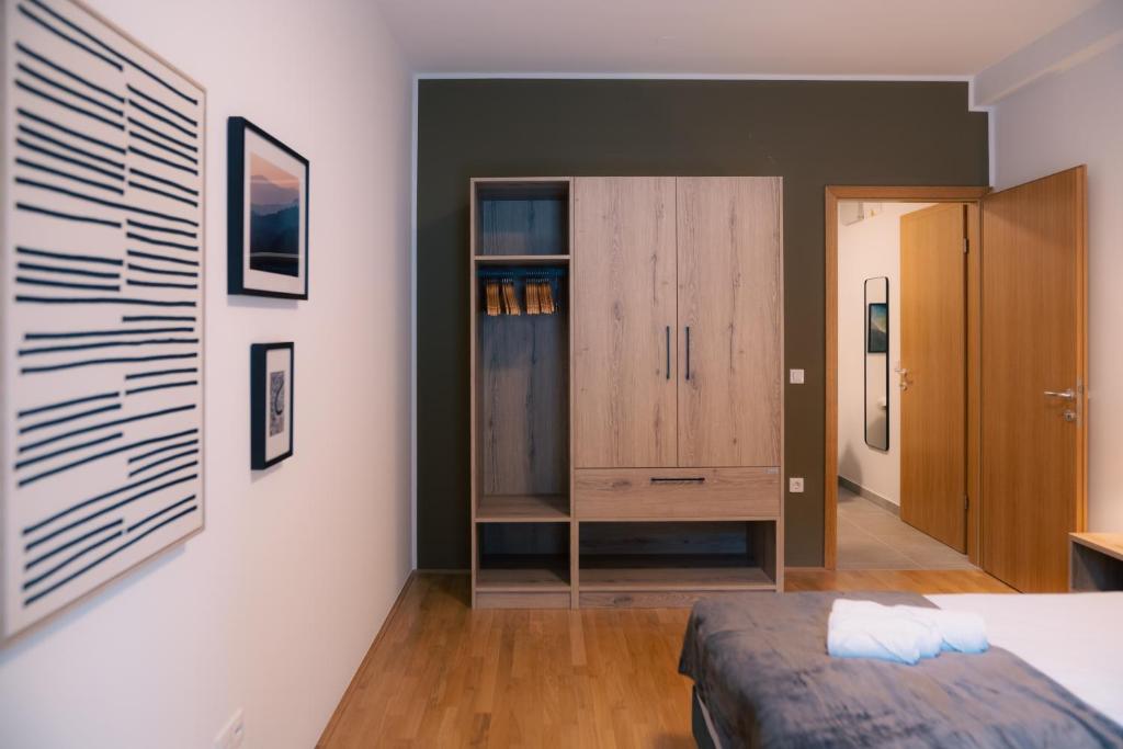 Postel nebo postele na pokoji v ubytování Peak Haven apartments, Pohorje