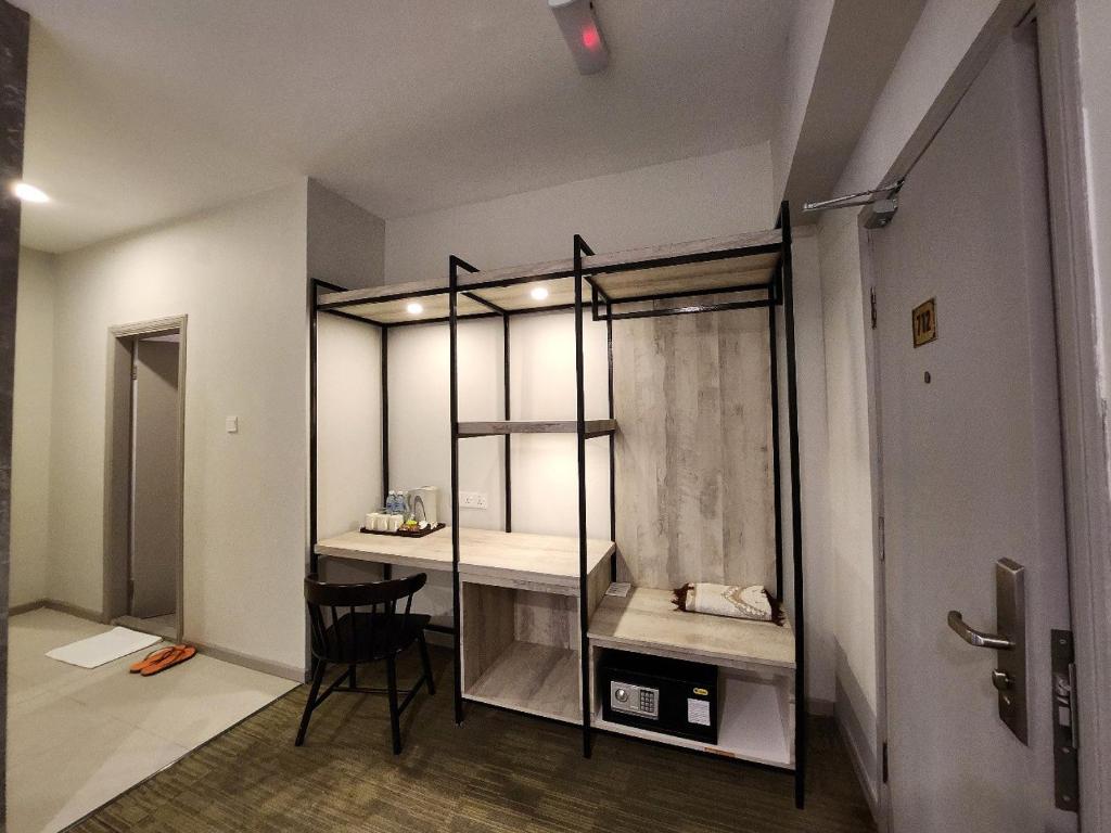 Postel nebo postele na pokoji v ubytování Perkasa Hotel Mt Kinabalu
