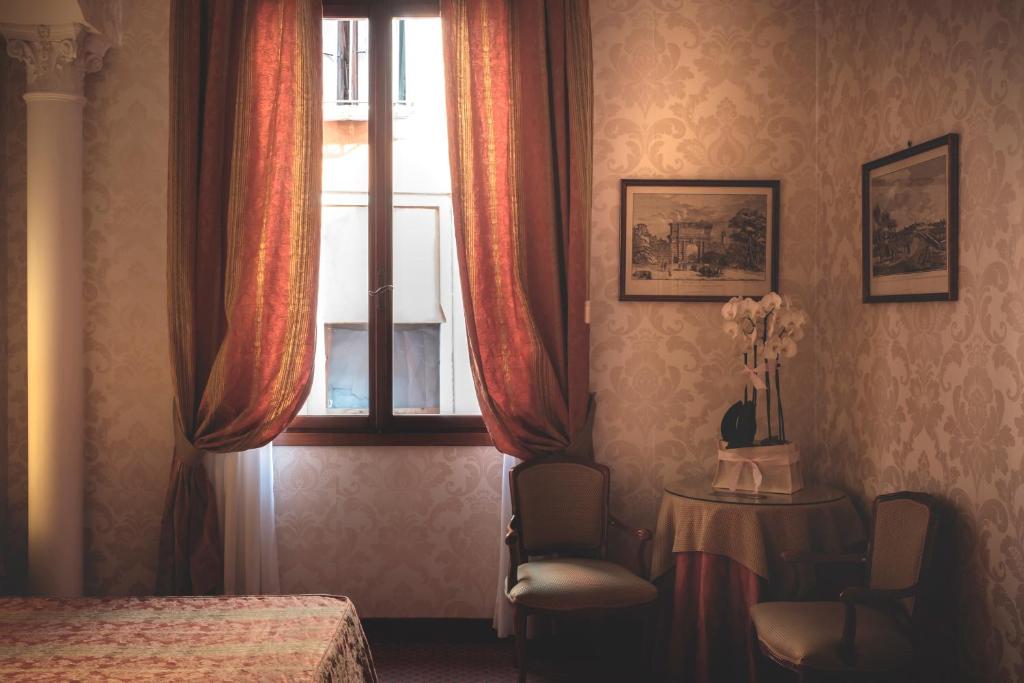 Postel nebo postele na pokoji v ubytování Hotel Kette