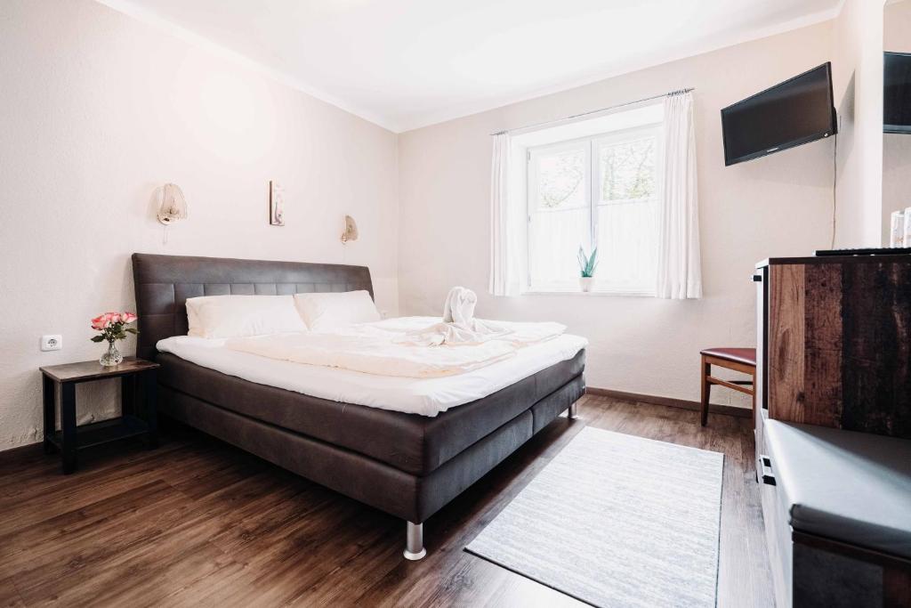 Postel nebo postele na pokoji v ubytování Gasthof Greimel