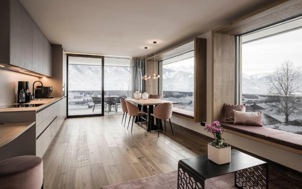 Kuchyň nebo kuchyňský kout v ubytování Timeless Dolomites Apartments