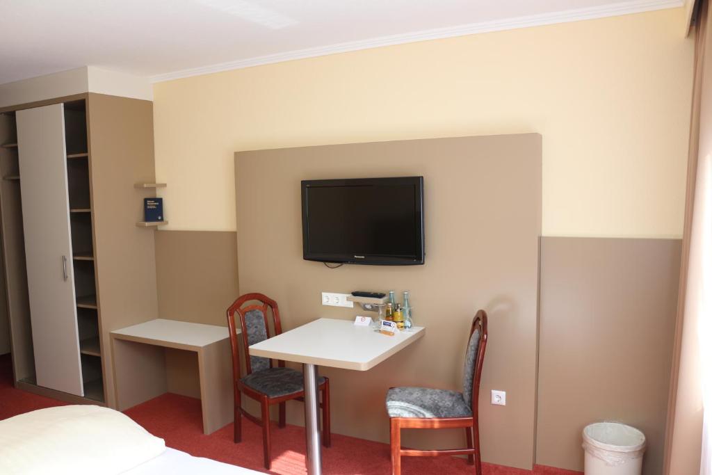 TV a/nebo společenská místnost v ubytování Hotel Graf Balduin