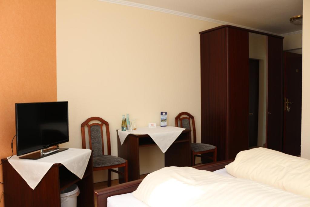 TV a/nebo společenská místnost v ubytování Hotel Graf Balduin