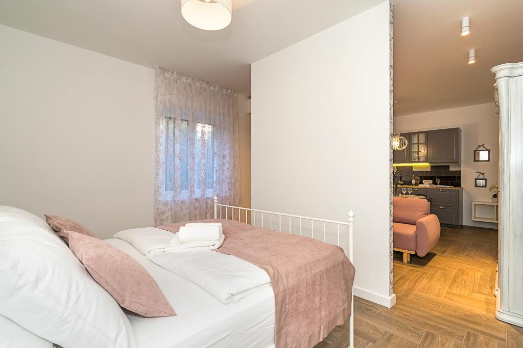 Postel nebo postele na pokoji v ubytování Studio apartments Marcel