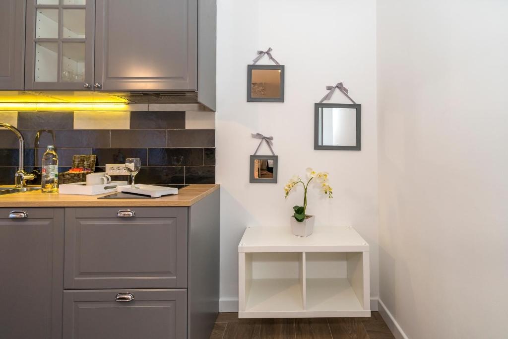 Kuchyň nebo kuchyňský kout v ubytování Studio apartments Marcel