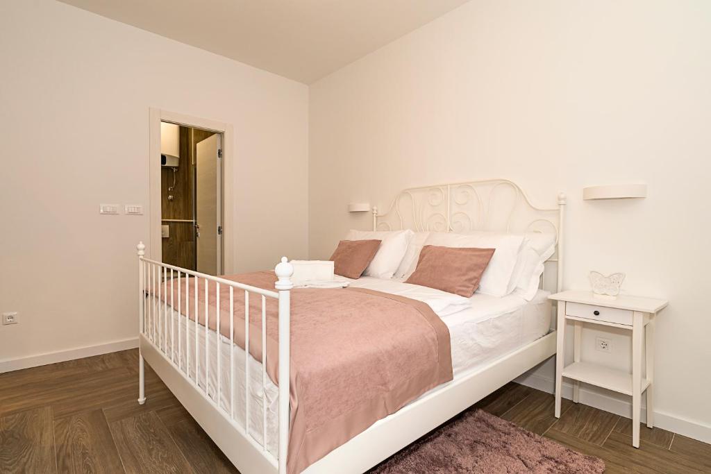 Postel nebo postele na pokoji v ubytování Studio apartments Marcel
