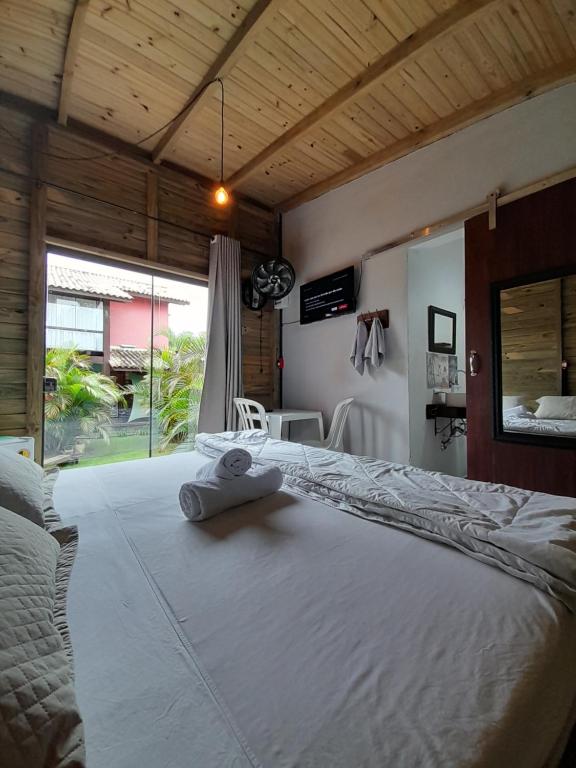 Cama ou camas em um quarto em Santa Monica Hospedaria