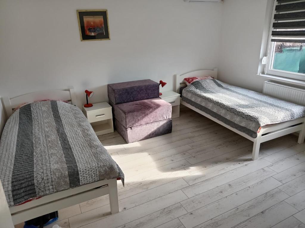Voodi või voodid majutusasutuse APARTMAN “POD KRALJEVICOM” toas