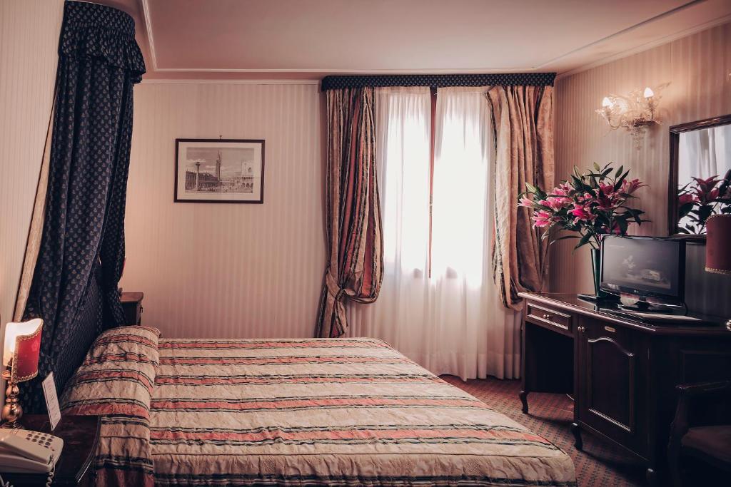 Postel nebo postele na pokoji v ubytování Hotel Kette