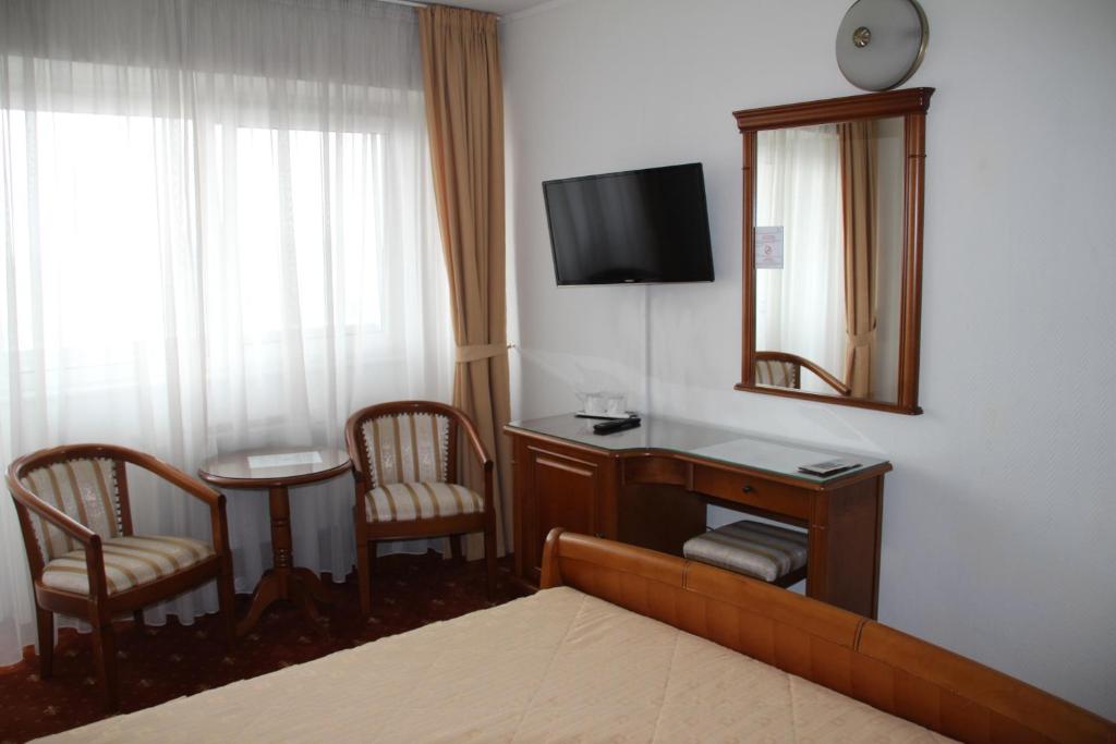 TV a/nebo společenská místnost v ubytování Hotel Belvedere