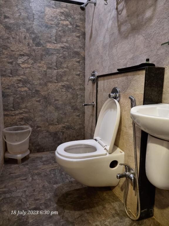 Koupelna v ubytování ANAND HOTEL
