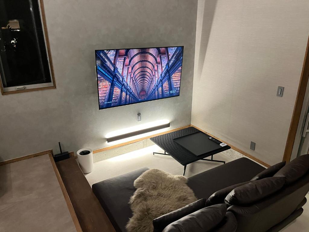 TV a/nebo společenská místnost v ubytování Villa CORTILE