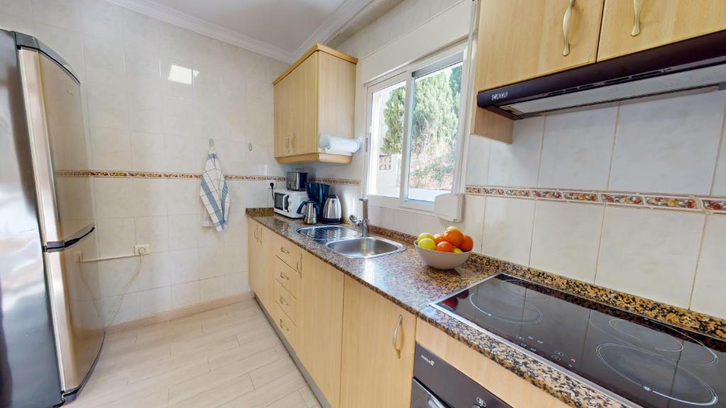 Kuchyňa alebo kuchynka v ubytovaní Apartamento Nueva Vida by Family Homes