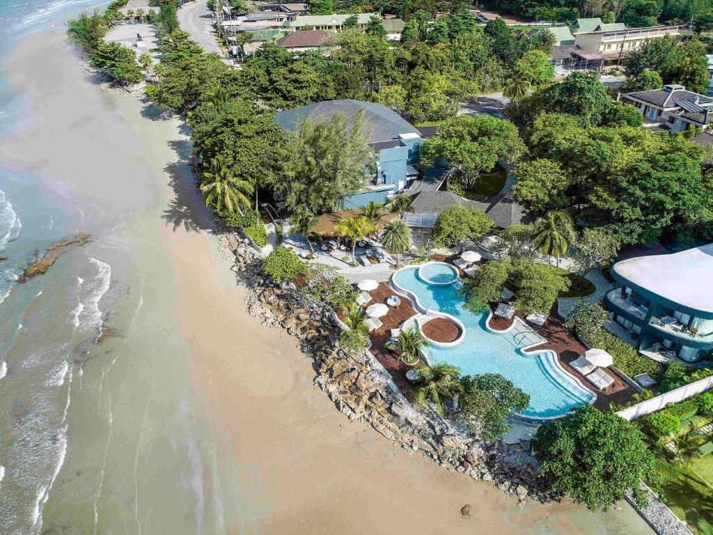 an aerial view of a resort with a beach at Mercure Rayong Lomtalay Villas & Resort in Mae Pim