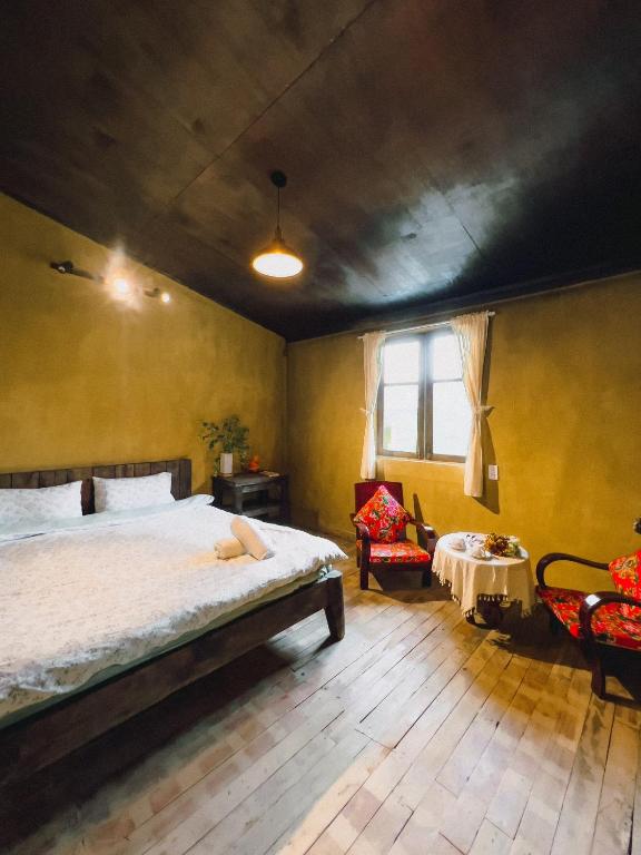 Postel nebo postele na pokoji v ubytování Maison de Hill Home