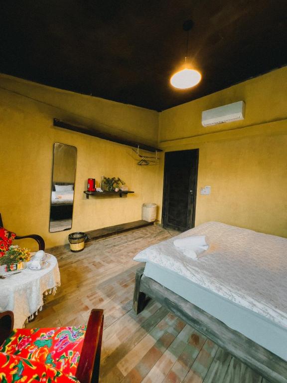 Postel nebo postele na pokoji v ubytování Maison de Hill Home