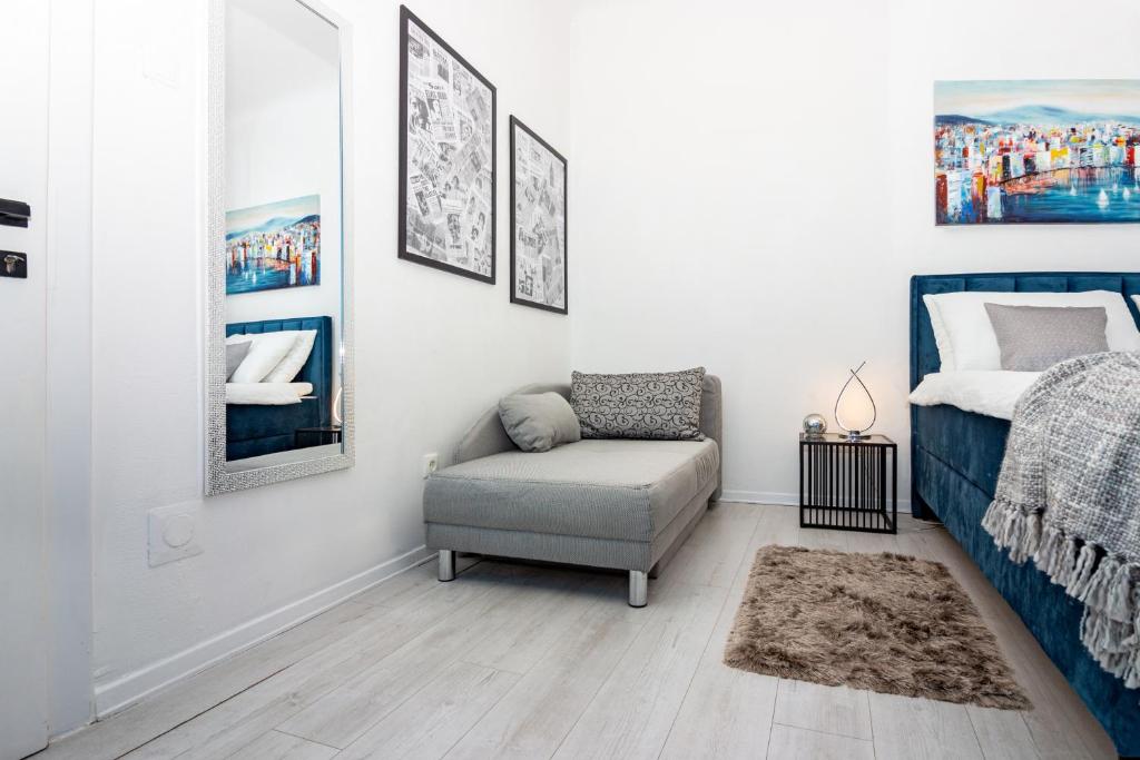 Posteľ alebo postele v izbe v ubytovaní Spacious Apartment Center