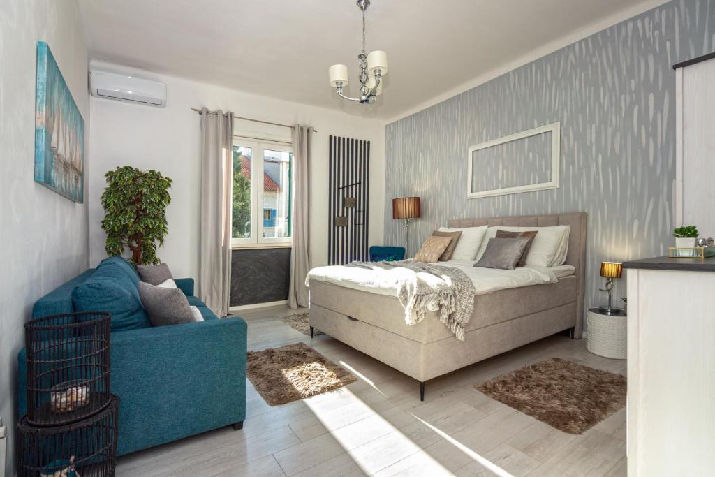 Posteľ alebo postele v izbe v ubytovaní Spacious Apartment Center