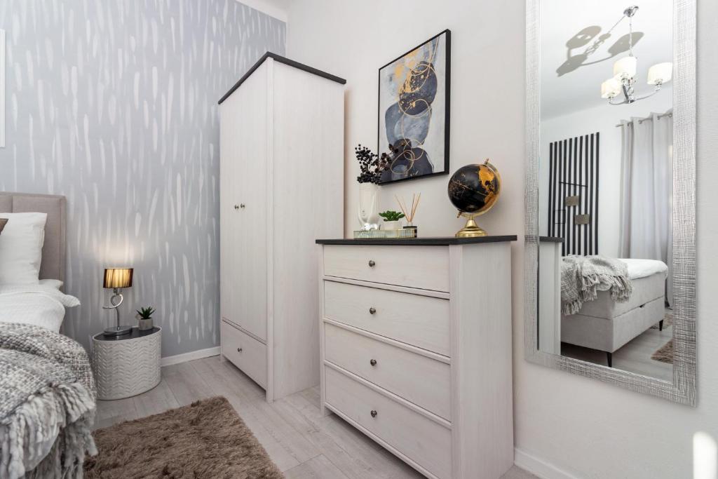 Posteľ alebo postele v izbe v ubytovaní Spacious Apartment Center