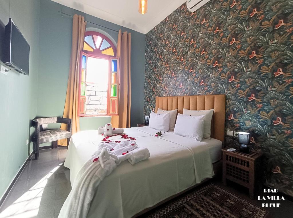 Postel nebo postele na pokoji v ubytování Riad la villa bleue & SPA