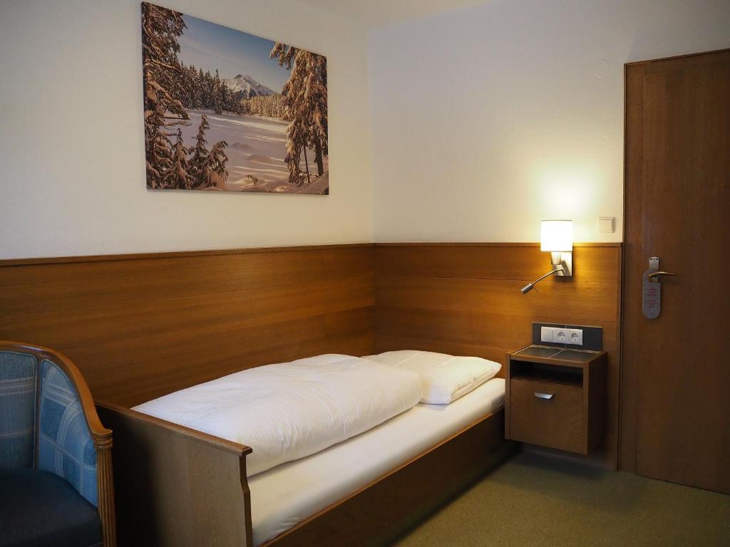 Postel nebo postele na pokoji v ubytování Hotel Egerthof