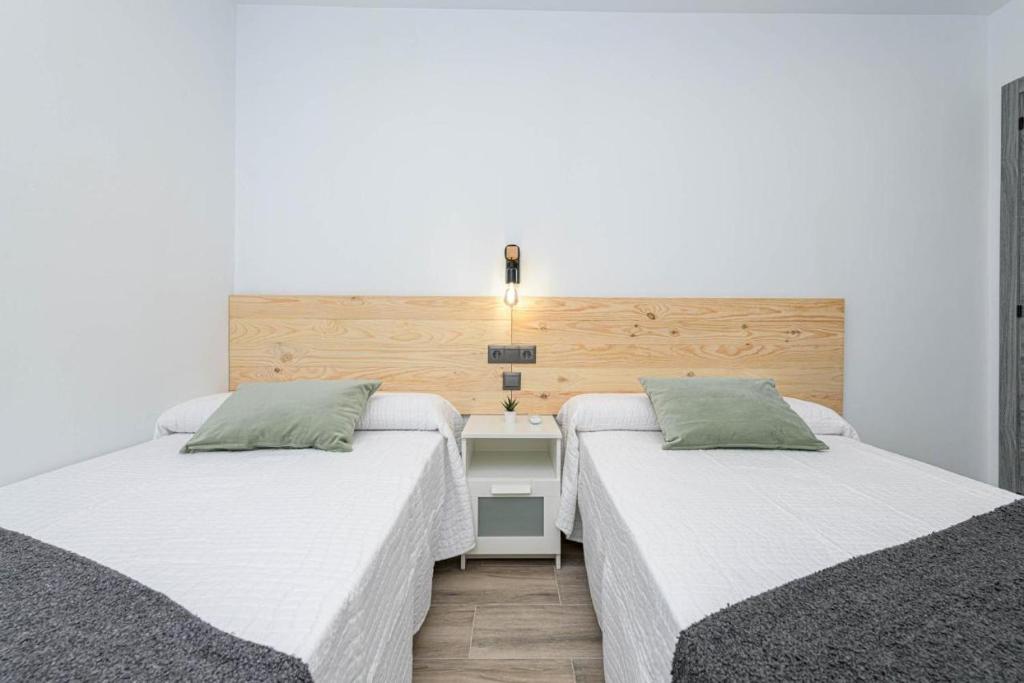 Postel nebo postele na pokoji v ubytování Casa Jabe