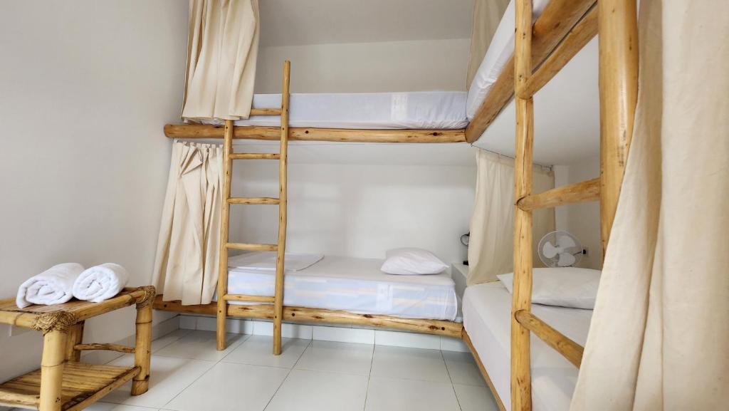 Postel nebo postele na pokoji v ubytování Kinti Guest House