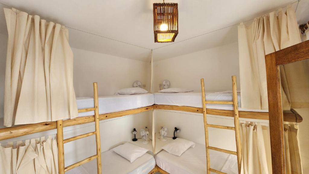 Postel nebo postele na pokoji v ubytování Kinti Guest House