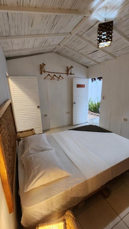 Postel nebo postele na pokoji v ubytování Kinti Guest House