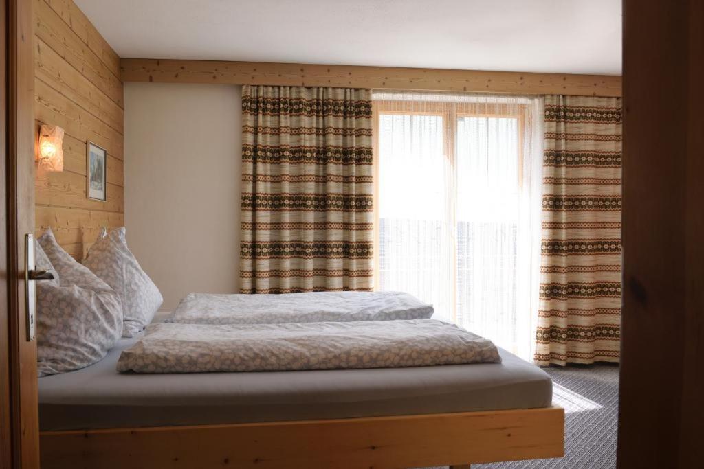 Postel nebo postele na pokoji v ubytování Haus Kohler
