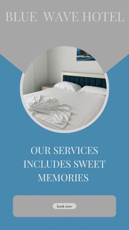 a picture of a bed in a room with a mirror at The Blue Horizon in Vlorë