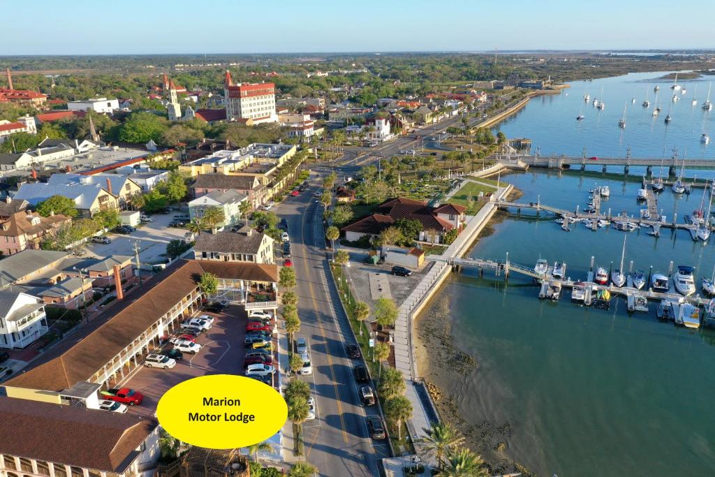 an aerial view of a marina next to the water at Historic Waterfront Marion Motor Lodge in downtown St Augustine in Saint Augustine