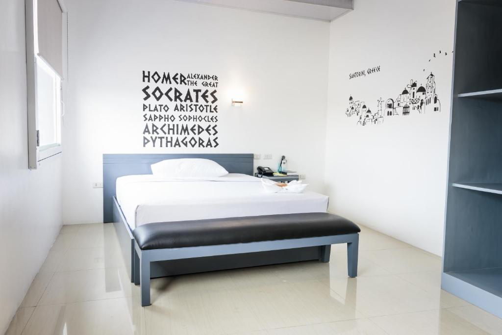 Postel nebo postele na pokoji v ubytování GC Suites