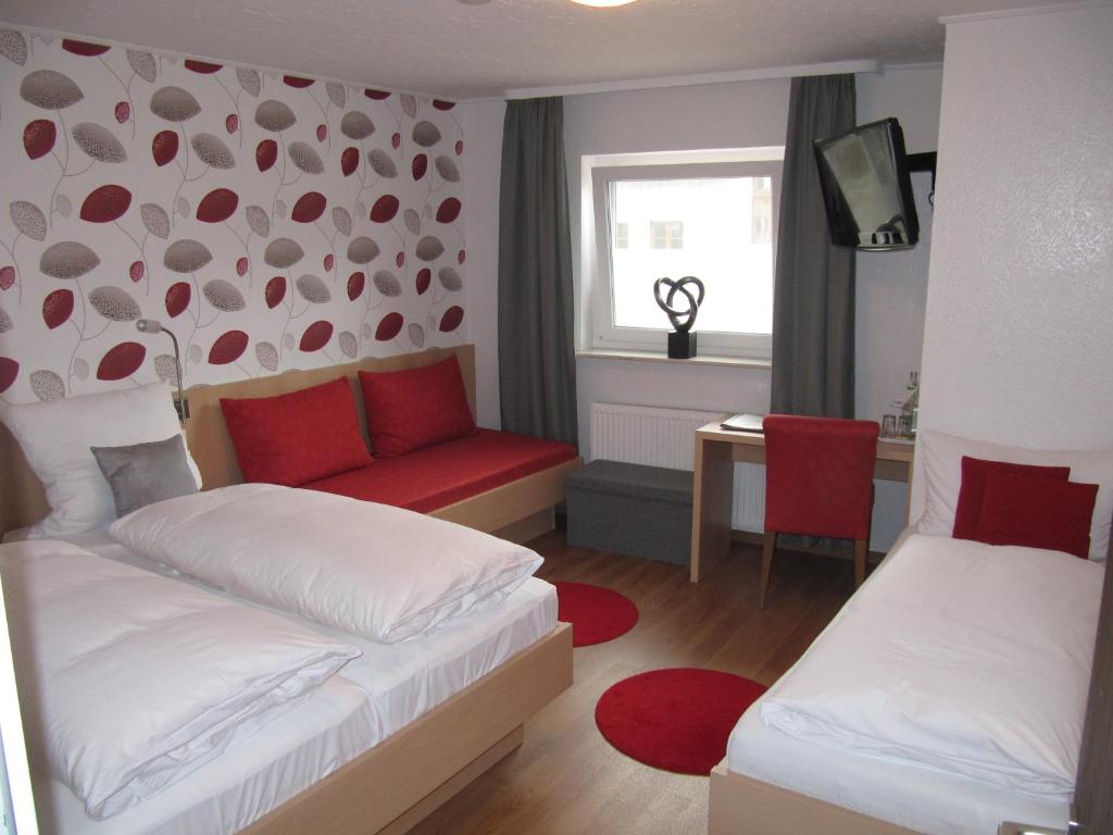 Postel nebo postele na pokoji v ubytování Hotel Ricci