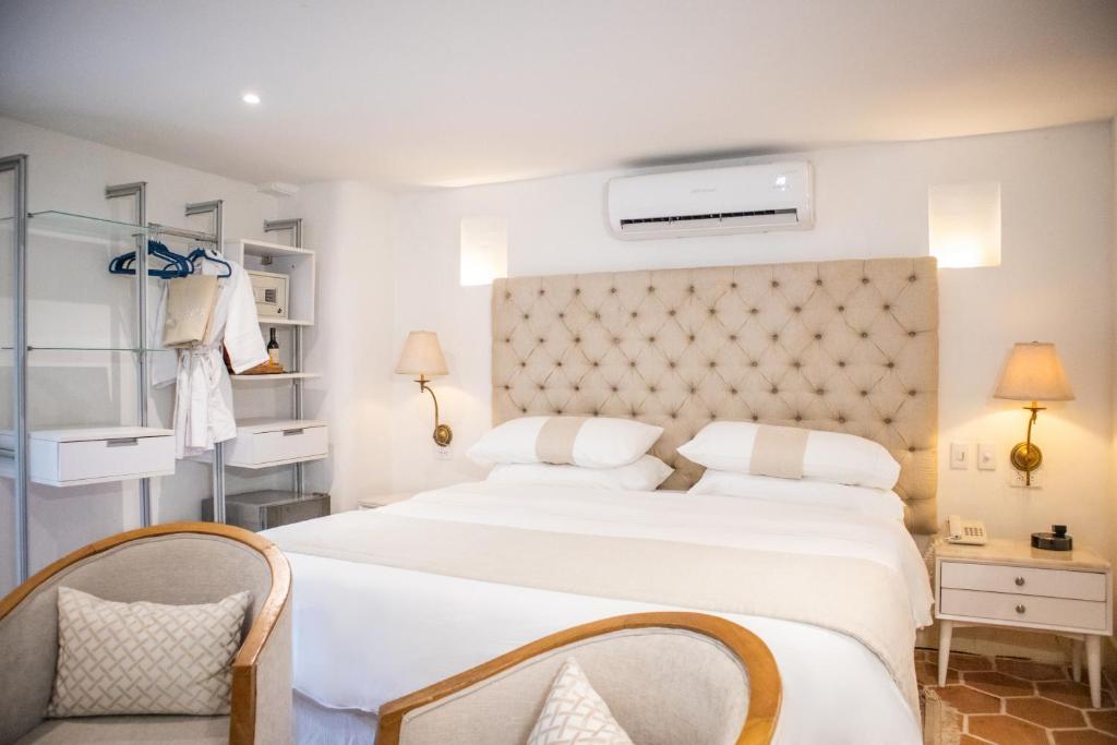 Postel nebo postele na pokoji v ubytování Hotel El Marqués by Faranda Boutique