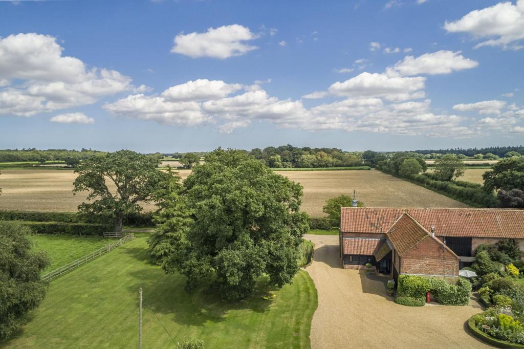 an overhead view of a building in a field at The Granary in Oulton