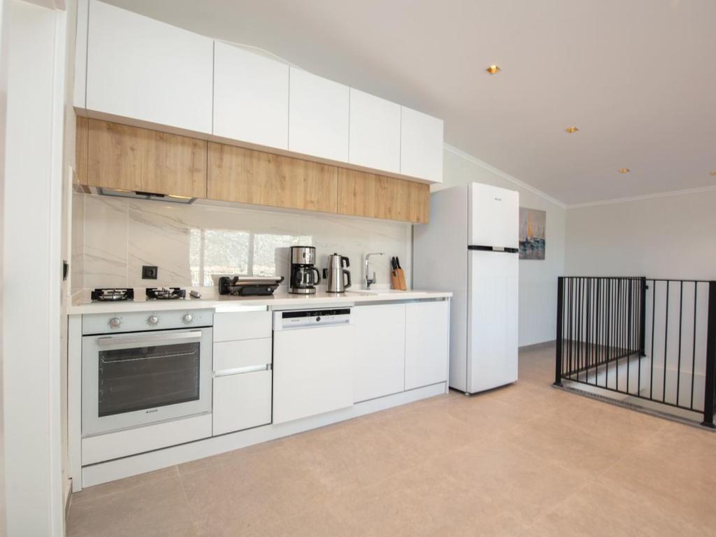 Kuchyň nebo kuchyňský kout v ubytování Asfiya Loft Apartments