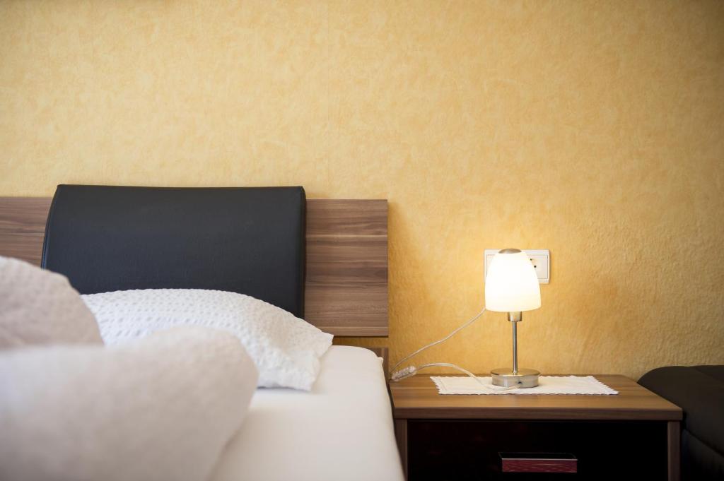 Postel nebo postele na pokoji v ubytování Sonnenberg