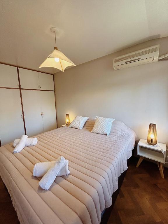 Postel nebo postele na pokoji v ubytování Casa Cedro Mendoza